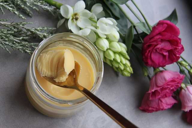 Ghee in a Glass Jar with Spoon
